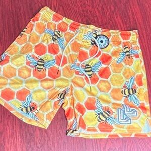 Vibrant Orange Bee Pattern Athletic Shorts